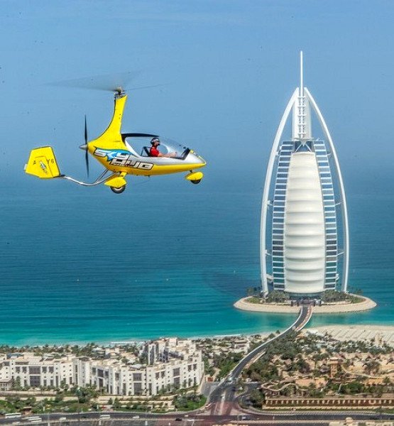 Gyrocopter Flight in Dubai. Price from 359 Take.Travel